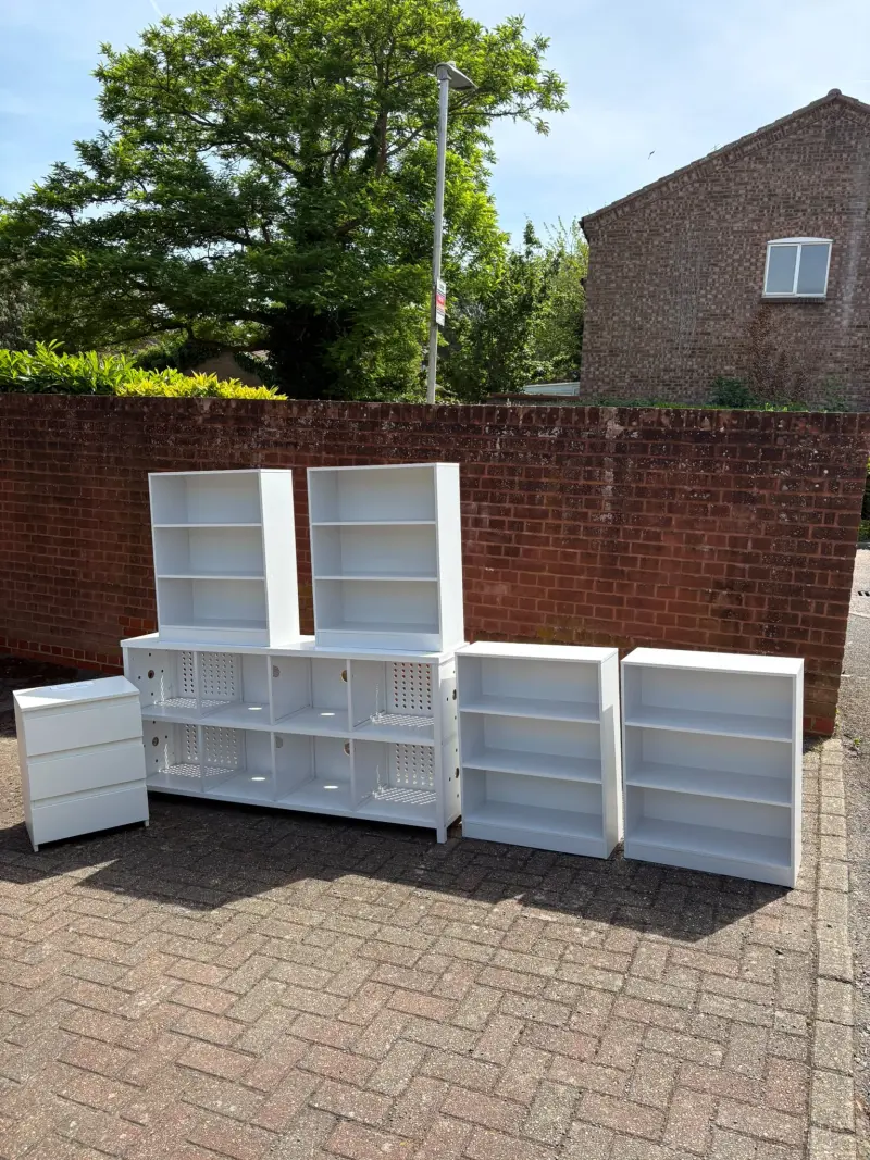 Multiple flat pack storage units and bookcases professionally assembled by Bricket Wood Handyman for a customer.